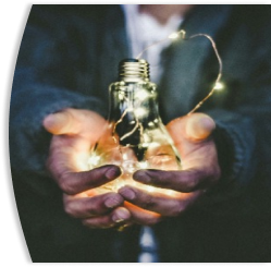person holding a lightbulb